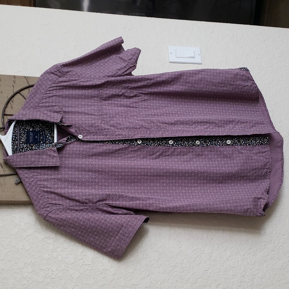 2 Men's button down short sleeve shirts.